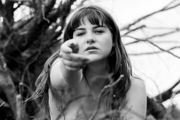 Powerful Nature Portrait of a Young Woman Reaching Out