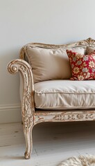 Antique White Sofa with Beige Cushions and Floral Pillow