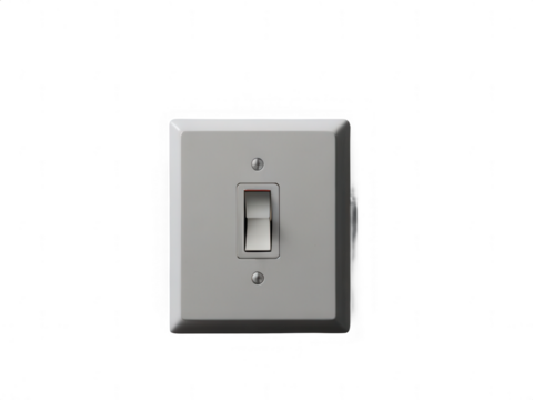 Close up of a light switch with a silver plate on a black background
