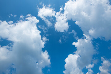 Beautiful blue sky background with white clouds.
