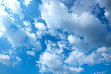 Beautiful blue sky background with white clouds.
