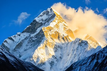 light clouds wrapping mountain peaks in dramatic
