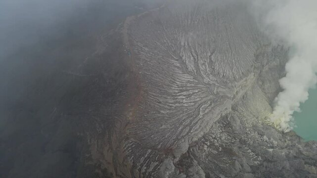 Ijen Volcano Indonesia steaming crater caldera lake Java island aerial drone