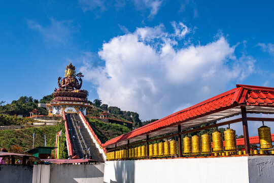 The beautiful and world's tallest statue of Chenrezig in the Pelling, West Sikkim, India.  View of A Huge metallic statue of Chenrezig at Sangha Choeling.