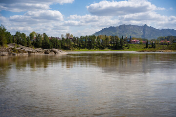 Fototapeta premium Lava rock formation known as the Love Stone on the bank of the Biya River in Altai, Russia. Concept of sacred natural landmarks and emotional symbolism in wild nature
