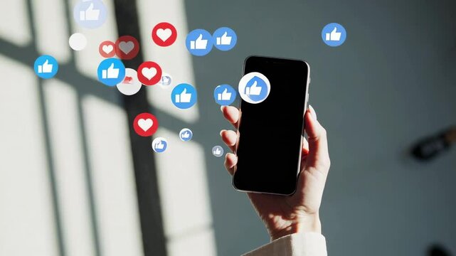 Professional marketer checking smartphone, receiving viral social media engagement through likes and heart notifications highlighting digital communication impact