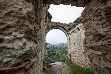 Historical places on the magnificent Latmos trekking route. Latmos Carian road,
Yediler Monastery and Castle. Historical ruins on the Latmos Carian road.Muğla, Turkey.
