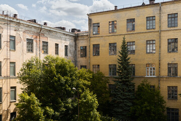 Urban Courtyard featuring Trees along with MultiStory Buildings in the Cityscape