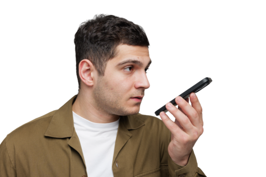Man engages with smartphone using voice command, showcasing modern communication technology in daily life during a casual moment