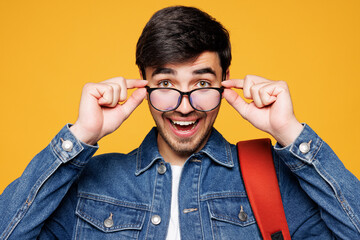 Close up young surprised happy smart satisfied boy student he wear jeans casual clothes glasses...