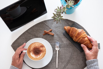 Healthy Morning Breakfast with Cappuccino and Fresh croissant