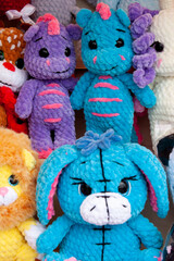 New soft knitted toys, hand made from yarn.