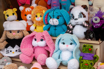 New soft knitted toys, hand made from yarn.
