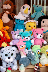 New soft knitted toys, hand made from yarn.