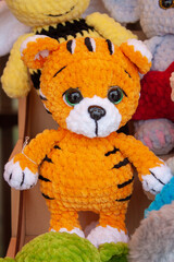New soft knitted toys, hand made from yarn.