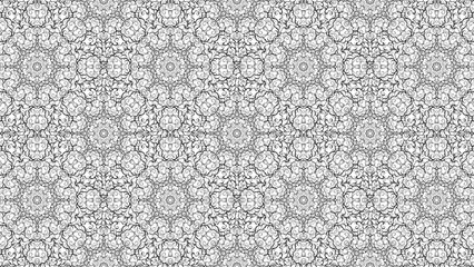 Black and white intricate pattern featuring floral elements and abstract shapes in a repeating design