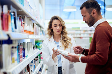 Pharmacist Assisting Customer with Product Selection in Bright Pharmacy Setting