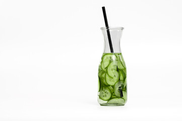 Isolated drink, flavored water with cucumber slices