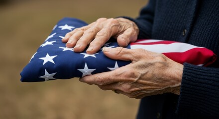 Holding Folded National Flag in Hands Displaying Patriotism and Respect