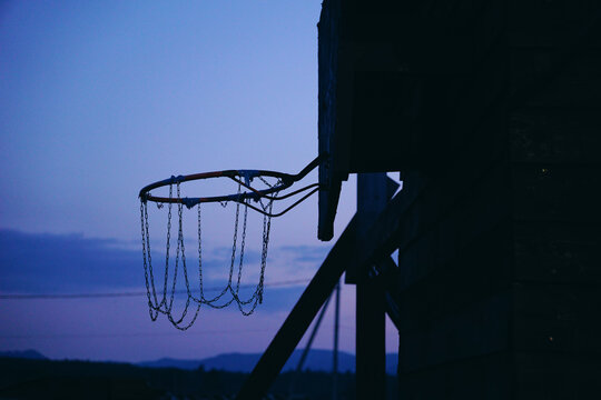 basketball hoop against the sky during sunset. Street basketball, sports infrastructure