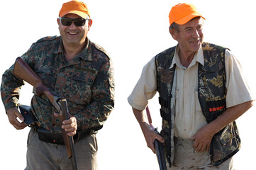 Silhouette of a hunter with a gun in the reeds against the sun, an ambush for ducks with dogs