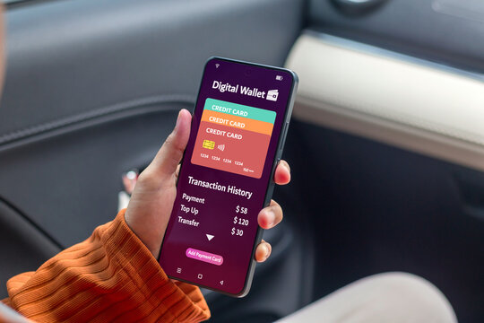 Woman using digital wallet on her smartphone to pay online