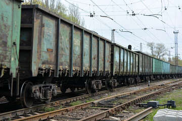 Heavy industry, heavy freight railway loading metal wagons pass along the gauges, railway lines.