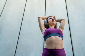 Fitness, runner or woman stretching in city for running training, cardio exercise or workout start....