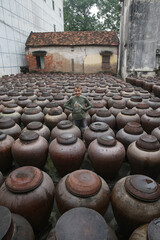 Ban Hung Yen soy sauce craft village (Bần Yên Nhân): traditional national craft, Vietnamese handicraft heritage village in near Hanoi city, Vietnam. Containers for soy sauce preparation. Landmark
