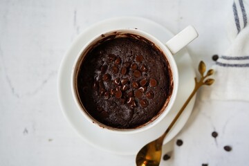 One minute microwave brownie | chocolate cake in a mug, selective focus