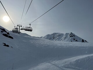 Sunrise on the ski lift in the alps © Michael