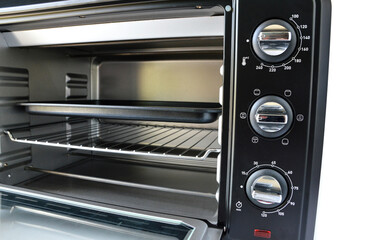 Appliance kitchen with a mini oven for cook homemade recipes in a practical way in a small space.