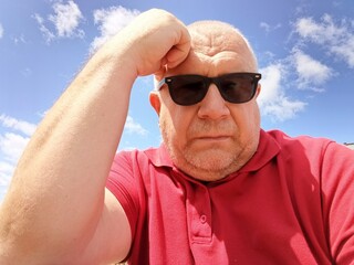 portrait of senior man with glasses