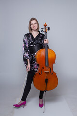 Woman with Cello, Bow, and Black Floral Robe