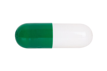 Green and white medicine capsule used in pharmaceutical treatment and healthcare, isolated on white...