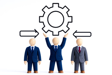 Three miniature figures dressed business suits with wooden heads, one raising hands towards gear symbol, representing teamwork and process management, with arrows indicating flow or direction