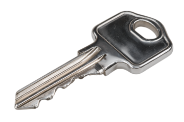 Single key close-up view ridged cut pattern visible chrome shine isolated on transparent background 
