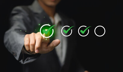 Business performance checklist, businessman using laptop doing online checklist survey, filling out digital form checklist, take an assessment, questionnaire, evaluation, online survey, online exam.