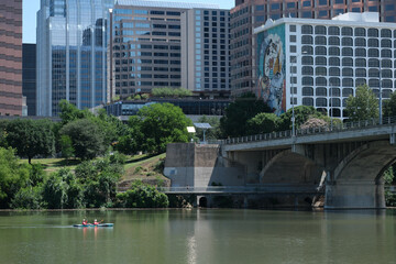 Lady bird lake in central Austin on a sunny day with watersports, boats, kayak