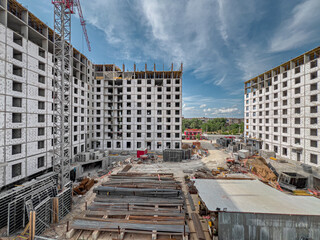 At the construction site of an urban high-rise building