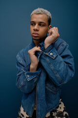 Daring style captured in vibrant hues with a confident young man in blue