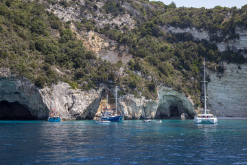 zakynthos, greece, blue caves, boats, cliffs, crystal clear water, summer