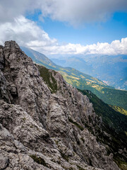 Rugged Alpine Peaks And Verdant Valleys In The Grigna Massif: Scenic Mountain Landscape In Lombardy Region Of Northern Italy Near Lake Como