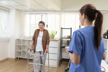 Fototapeta premium Healthcare, caregiver, hospitality, senior people, young nurse helping elderly woman with seated stretching activity on the couch, promoting trust, wellness, and positive physical therapy at home