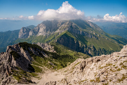 Rugged Alpine Peaks And Verdant Valleys In The Grigna Massif: Scenic Mountain Landscape In Lombardy Region Of Northern Italy Near Lake Como