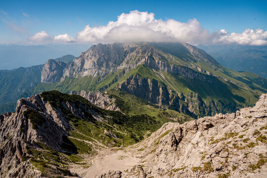 Rugged Alpine Peaks And Verdant Valleys In The Grigna Massif: Scenic Mountain Landscape In Lombardy Region Of Northern Italy Near Lake Como