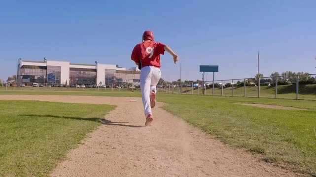 Follow Shot of Baseball Player Running Toward Base