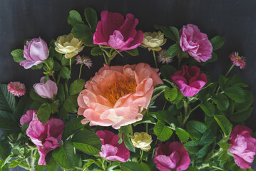 Vibrant Flower Bouquet with Irises and Roses. Floral art. Floral design. Botanical background.