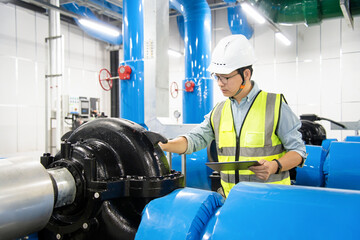 asian male engineer is working on a Cooling system pipeline