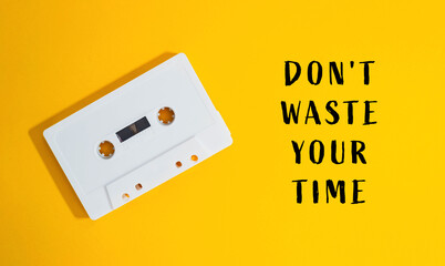 cassette tape is on yellow background with the words Dont Waste Your Time